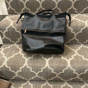 I’m selling black vertical purse